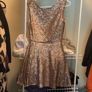 Gold sequin open-back cocktail dress